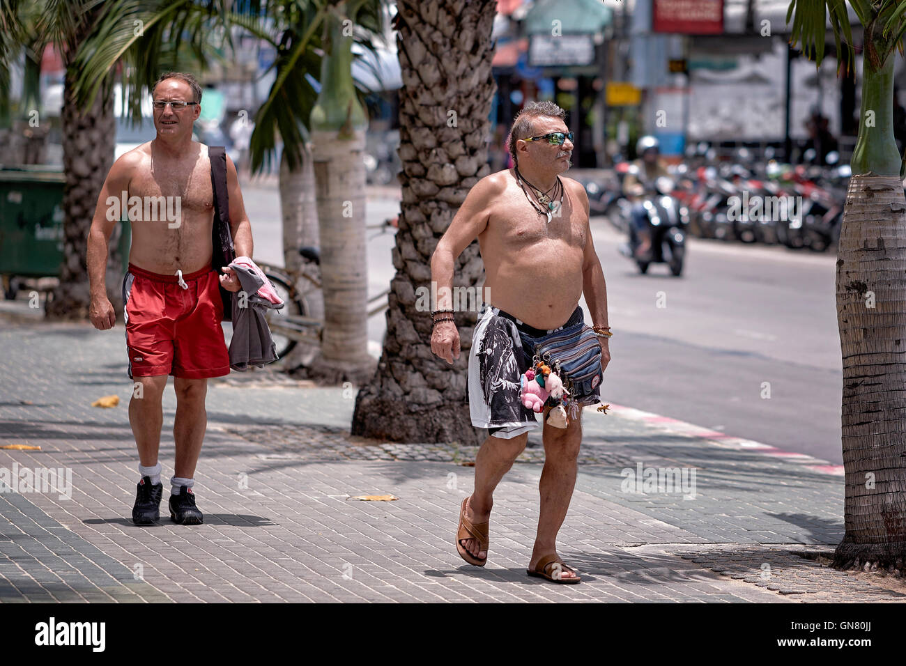 Inappropriately dressed Caucasian male wearing Speedos swimming trunks on  the street. Pattaya Thailand S. E. Asia Stock Photo - Alamy