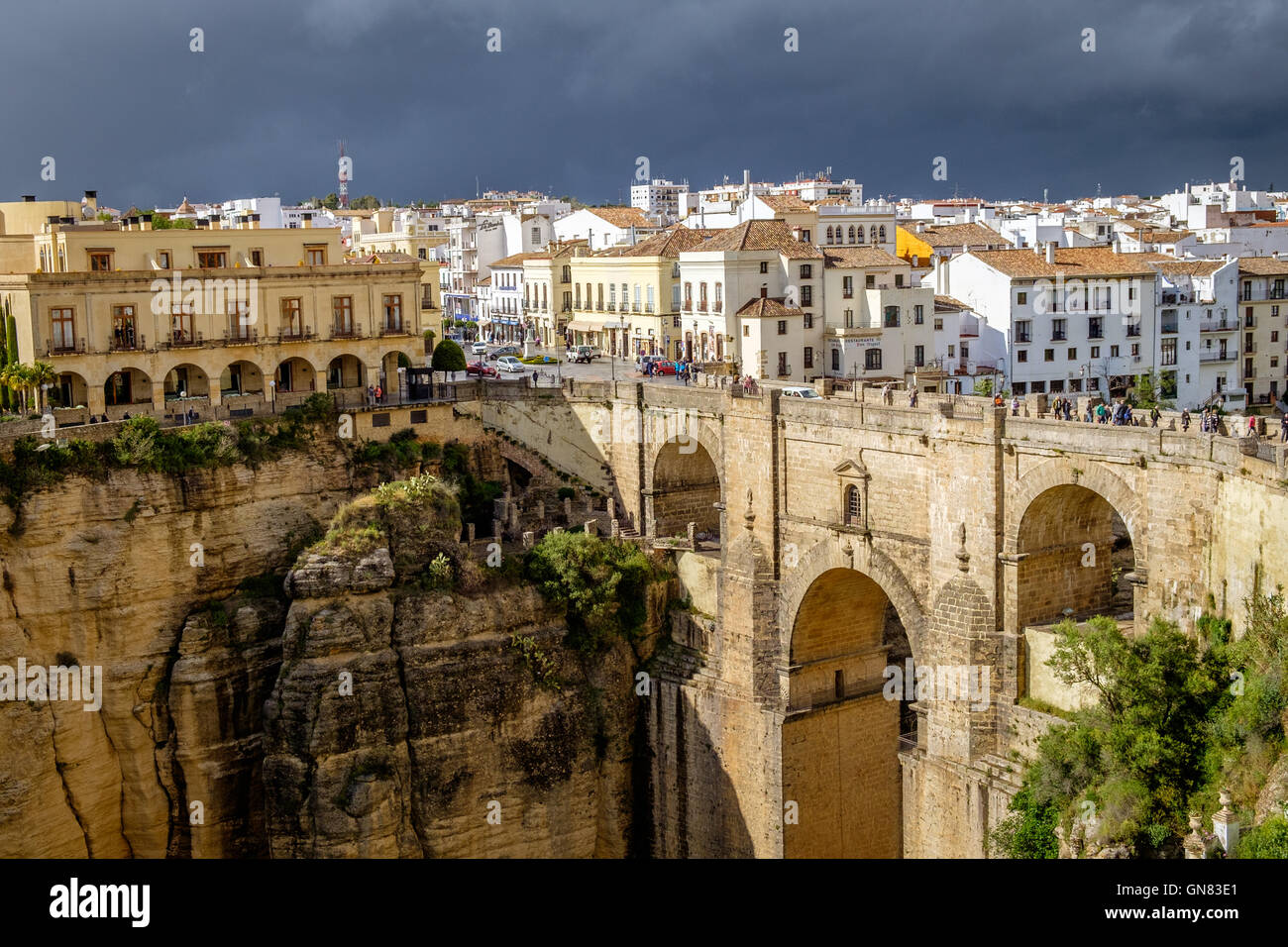 The Puente Nuevo bridge spanning the Guadalevin River and dividing the city of Ronda in southern Spain Stock Photo