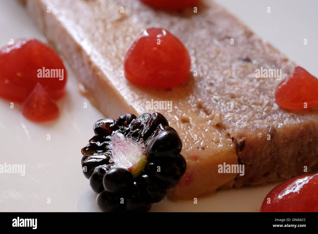 Polish goose terrine with purple plum and brioche served in Bialy