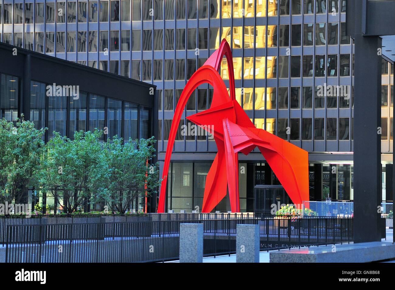 The 'Flamingo' sculpture by famed artist Alexander Calder, a 53-foot, 50-ton work of art located in the Chicago's Federal Plaza. Chicago, Illinois, US Stock Photo