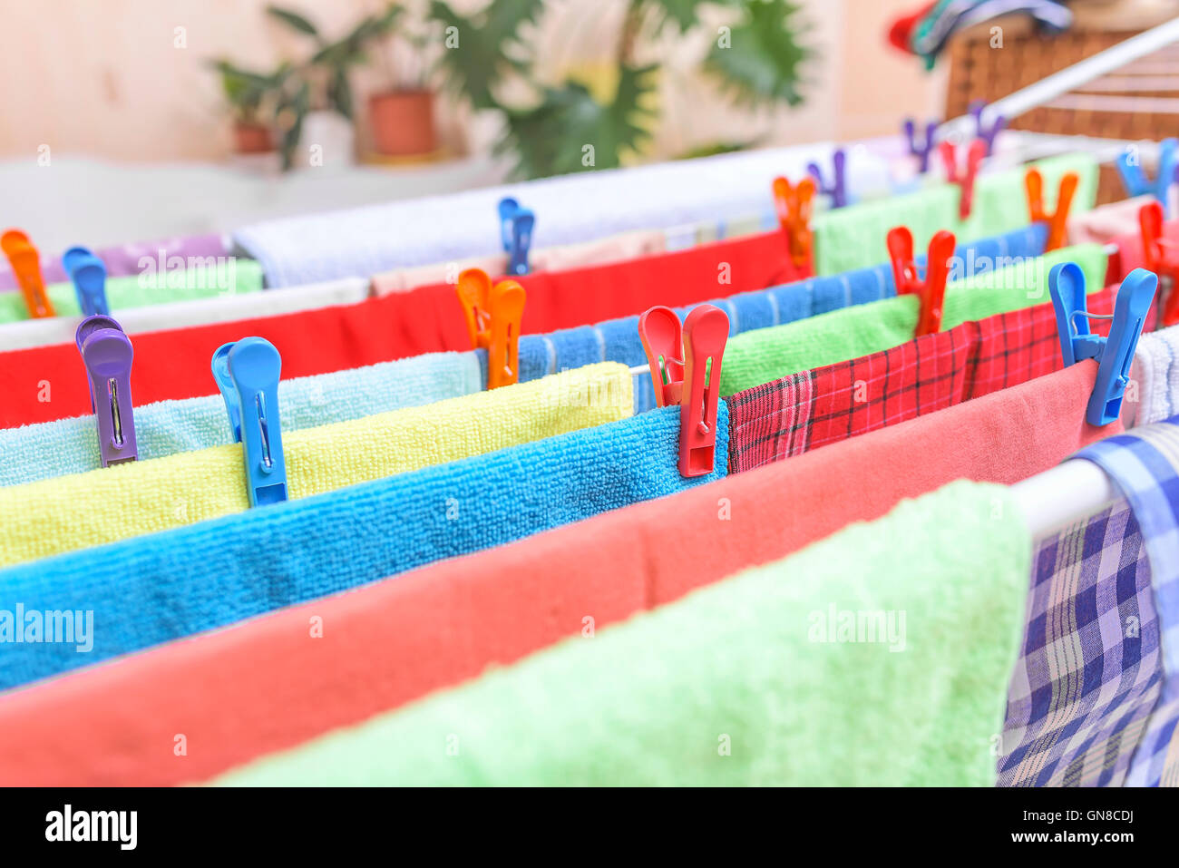 Beautiful multicolored clothes drying in the dryer Stock Photo Alamy