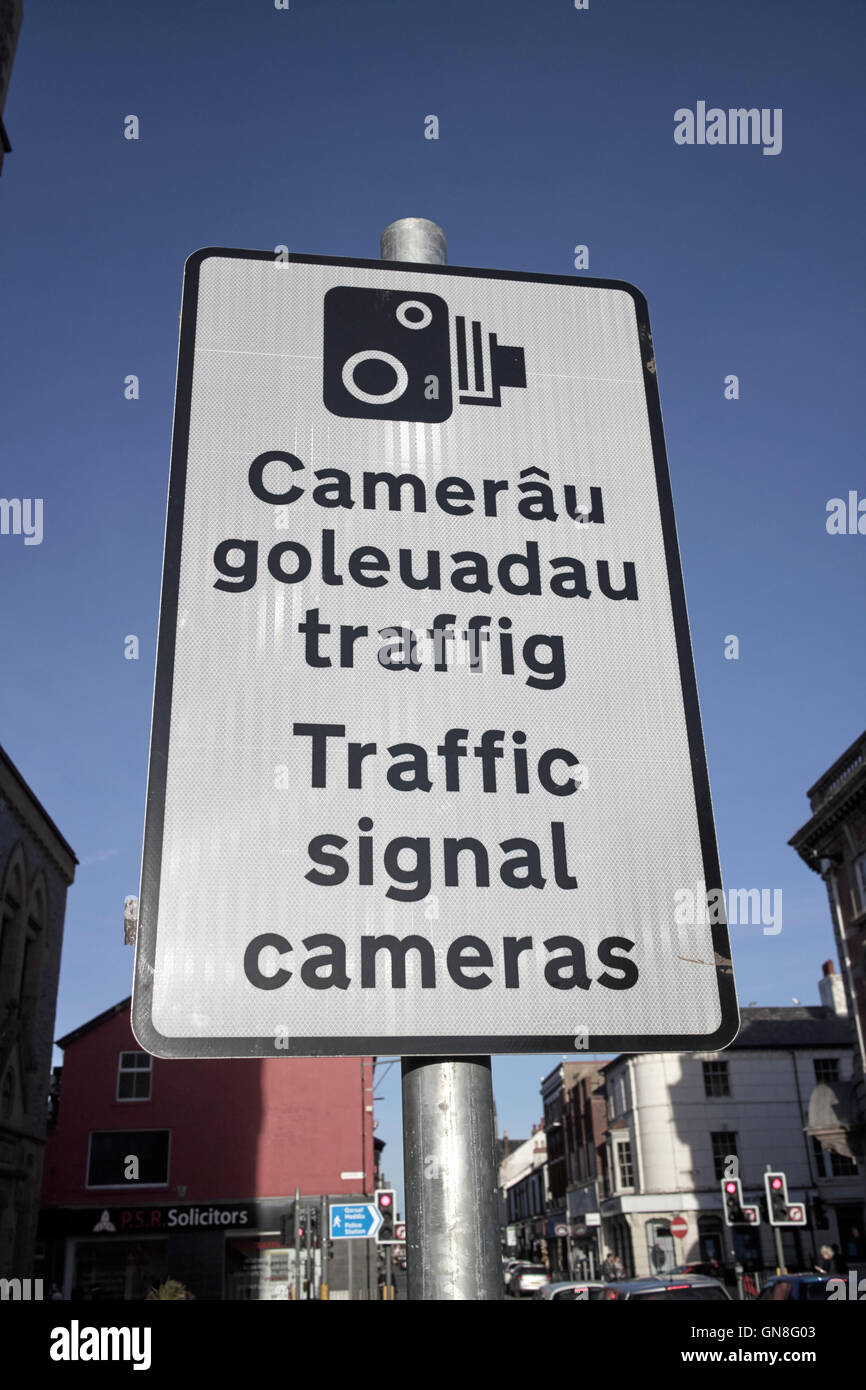 Bilingual welsh english road traffic signal cameras sign Stock Photo