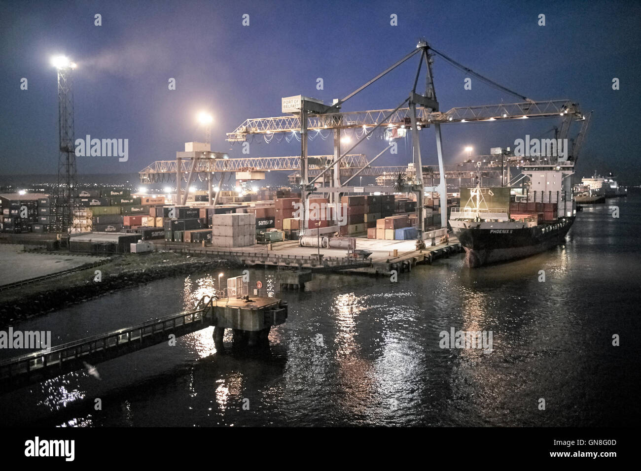 Belfast harbour freight terminal at night ni northern ireland Stock Photo