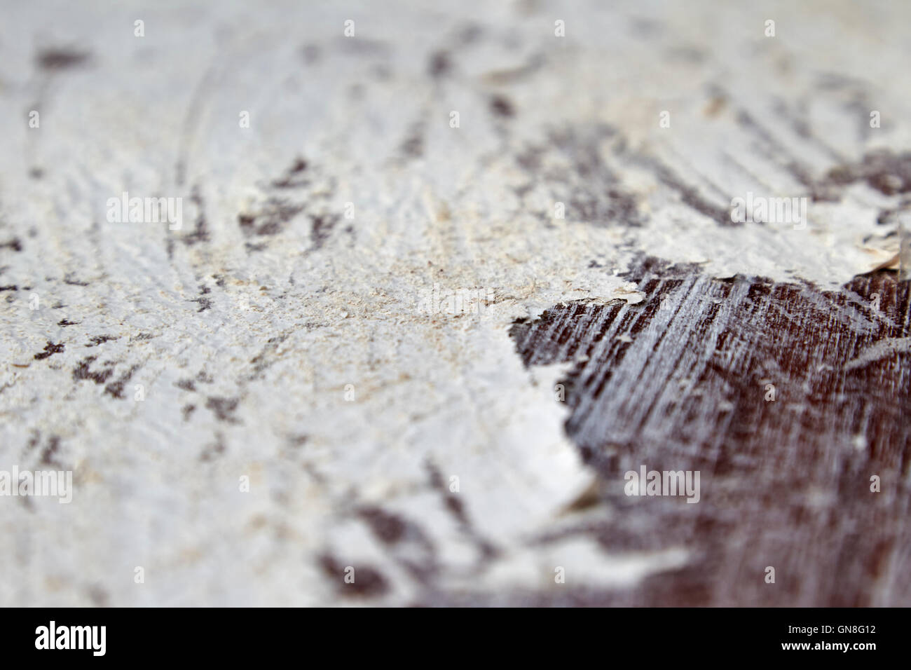 paint bubbling up due to application of paintstripper on a wooden door