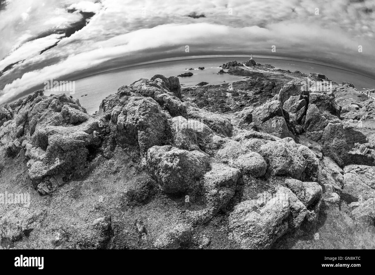 The lighthouse at La Corbière is the extreme south-western point of Jersey in St. Brelade. Stock Photo