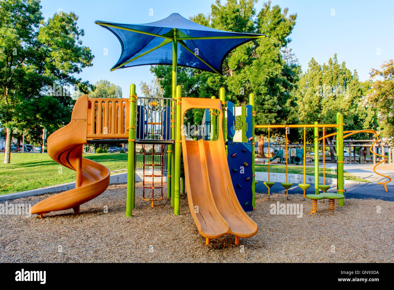 Children's Slide in Amusement Park in the Morning Stock Photo