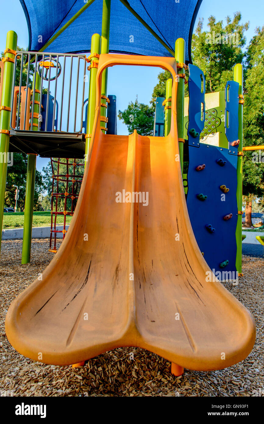 Children's Slide in Amusement Park in the Morning Stock Photo
