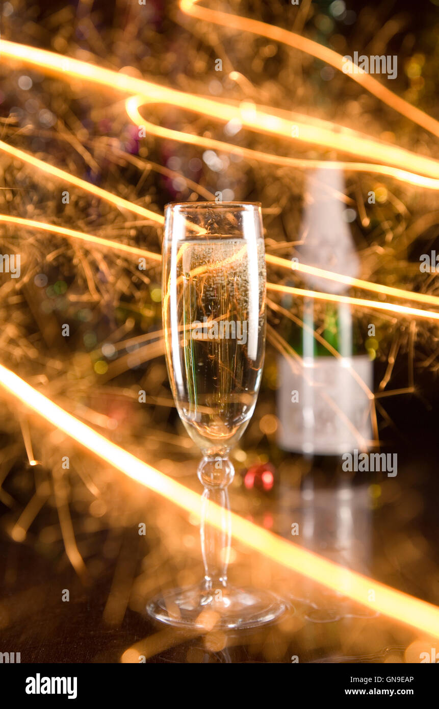 New Year card with champagne glass and sparkles Stock Photo - Alamy