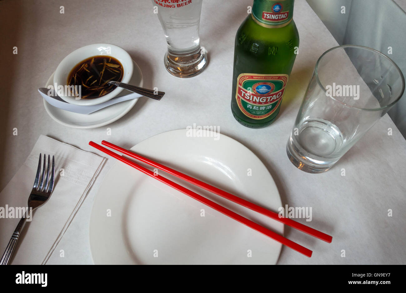 Tsingtao Chinese beer at a restaurant in Chinatown, New York City Stock Photo