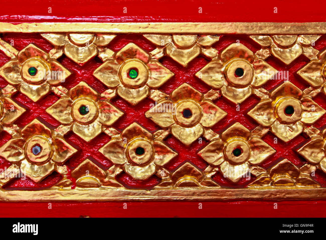 Golden Thai pattern design on temple wall Stock Photo - Alamy