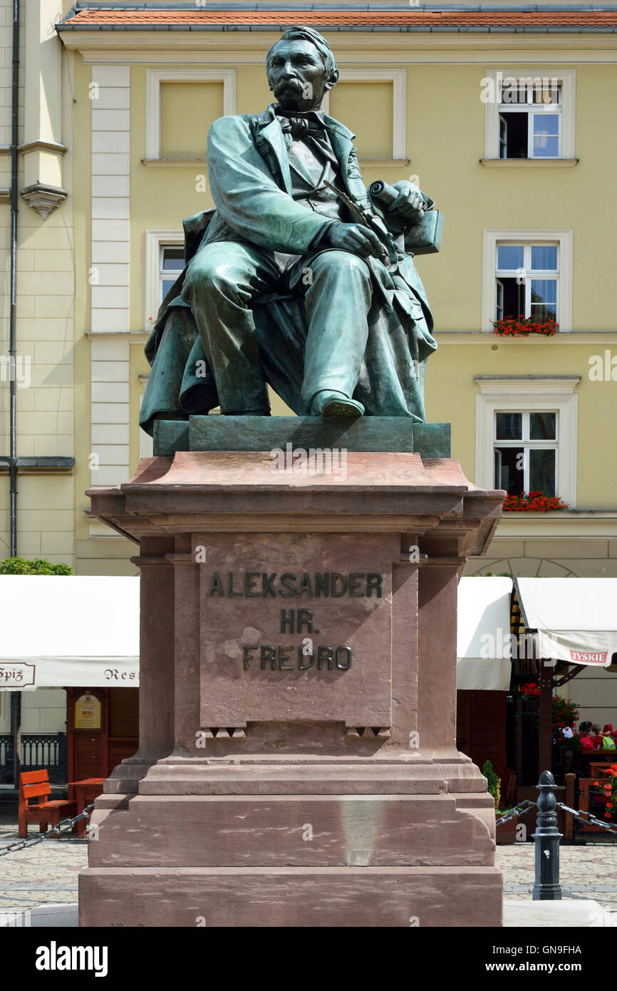 Statue of the Polish poet Aleksander Fredro in the Market Square in front of the Town Hall of Wroclaw in Poland. Stock Photo