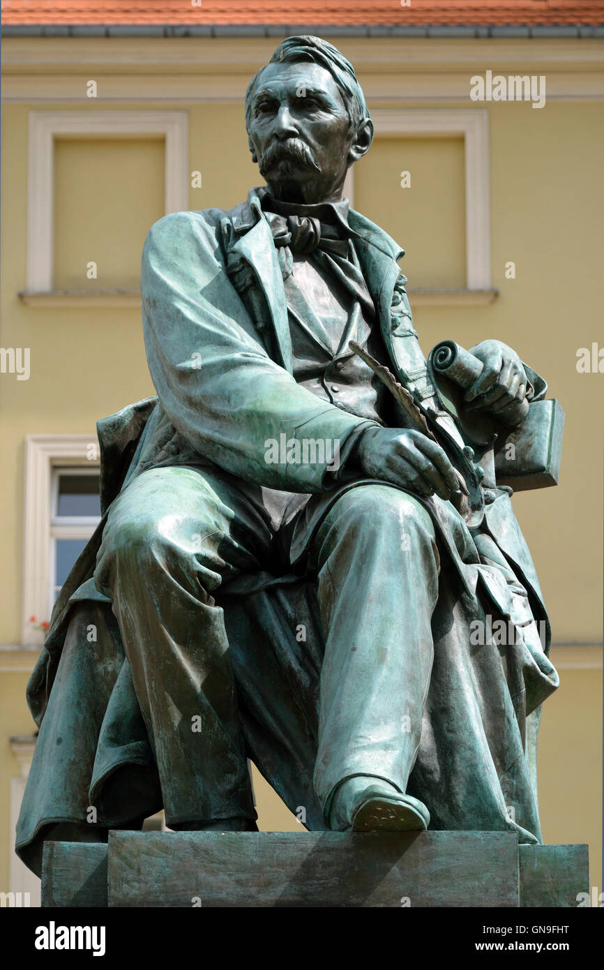 Statue of the Polish poet Aleksander Fredro in the Market Square in front of the Town Hall of Wroclaw in Poland. Stock Photo