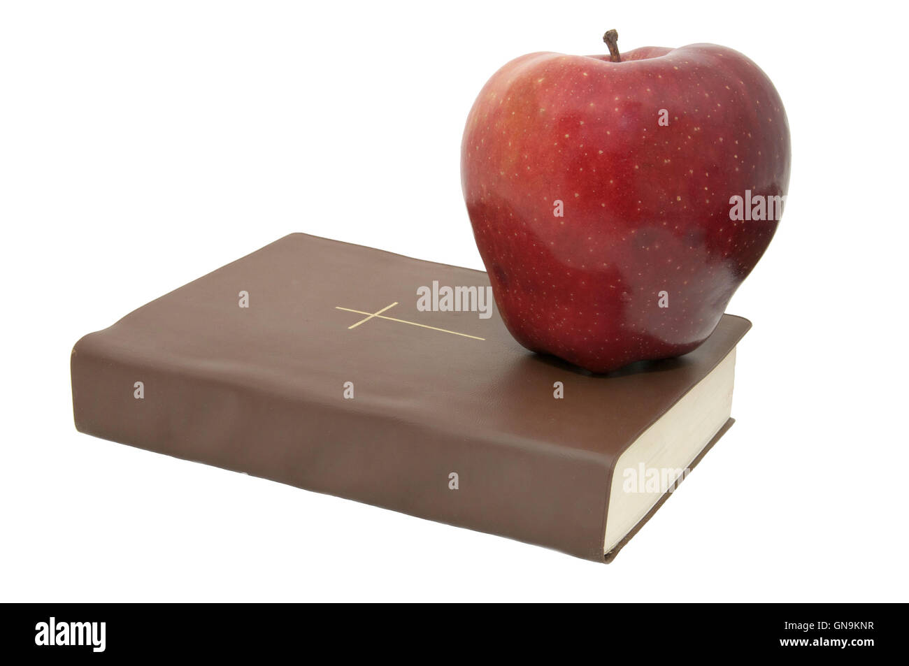 the bible and an apple Stock Photo Alamy