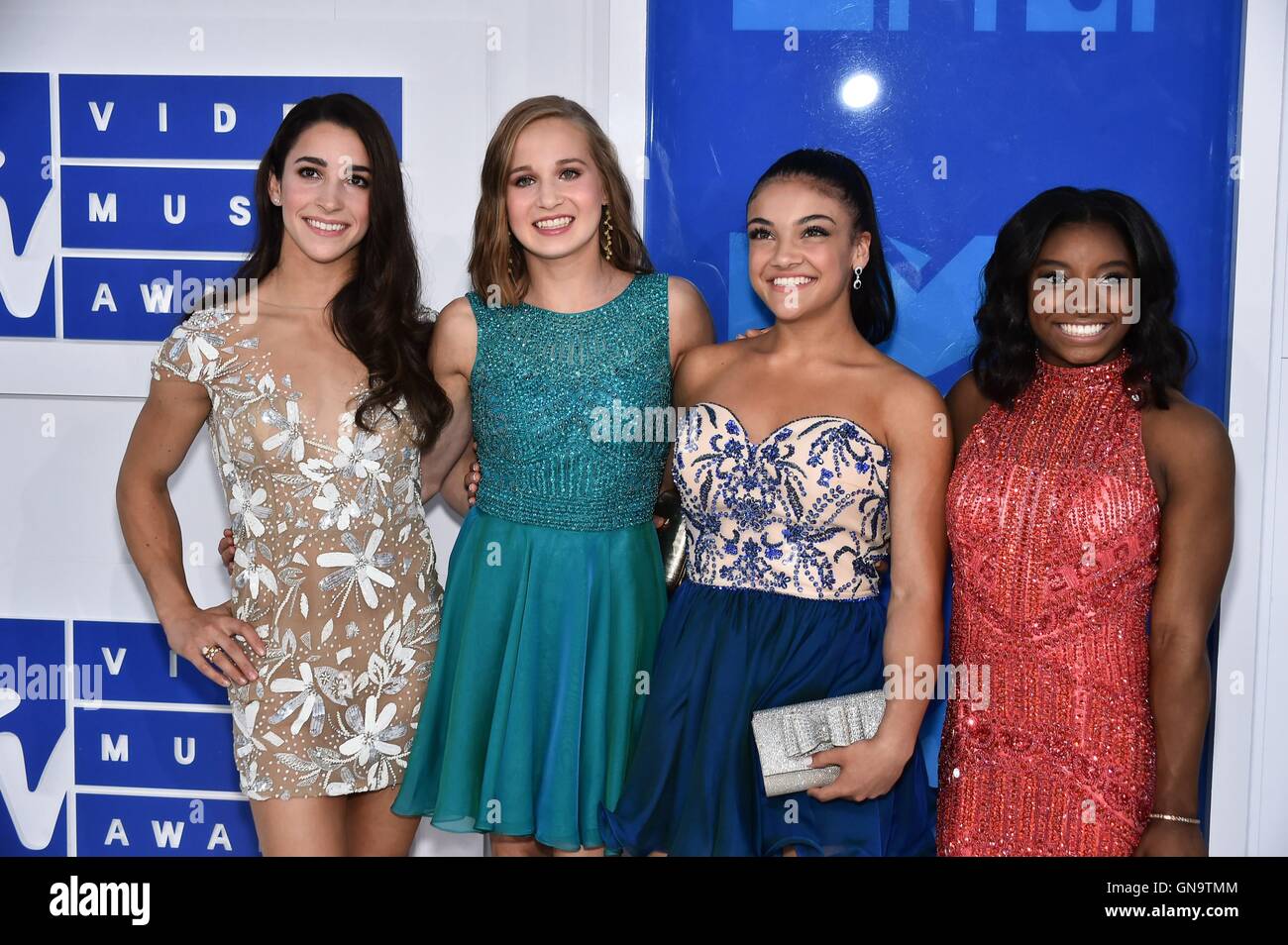 New York, NY, USA. 28th Aug, 2016. Olympic gymnasts, Aly Raisman, Madison Kocian, Laurie Hernandez, Simone Biles at arrivals for 2016 MTV Video Music Awards VMAs - Arrivals 2, Madison Square Garden, New York, NY August 28, 2016. Credit:  Steven Ferdman/Everett Collection/Alamy Live News Stock Photo