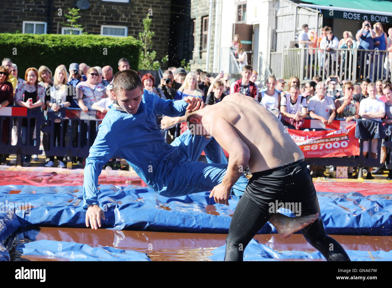 Cousins compete in the mens final of the world gravy wrestling