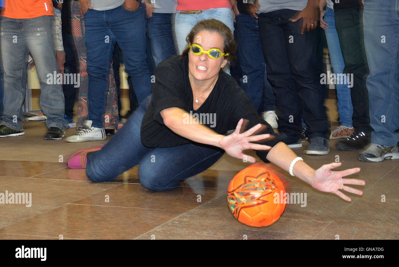 Participants of a course for soon-to-be trainers for parasports try their luck in the parasport 'goalball' wearing darkened glasses in a classroom in Rio die Janeiro, Brazil, 14 May 2016. The first Paralympic Games in South America are a big change to promote parasports. Brazil aims to ascend to one of the five best nations - and the country gets support from Germany in this ambition. Photo: Georg Ismar/dpa Stock Photo