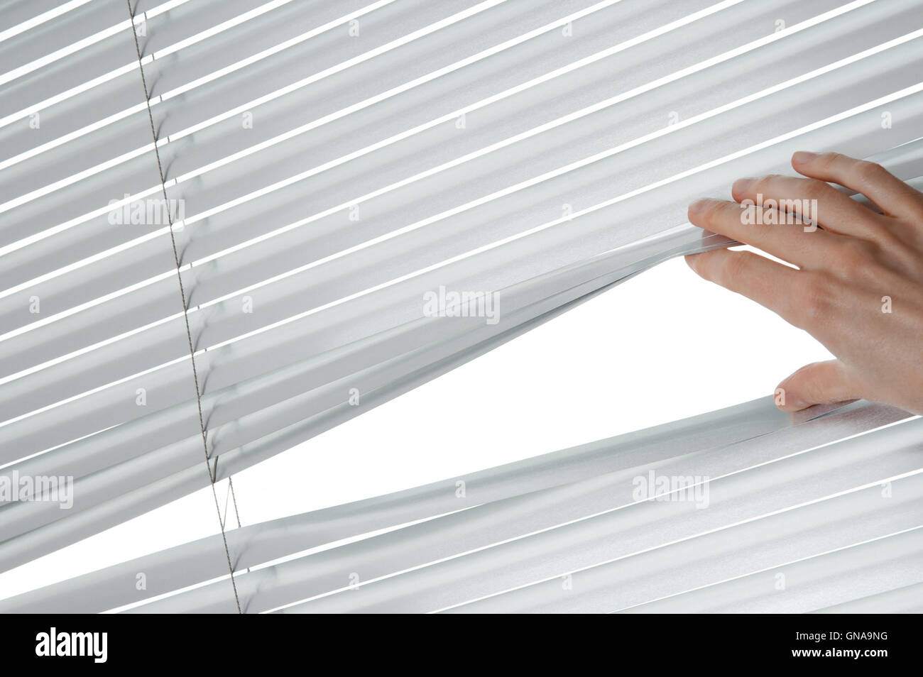 Female hand opening blinds Stock Photo Alamy
