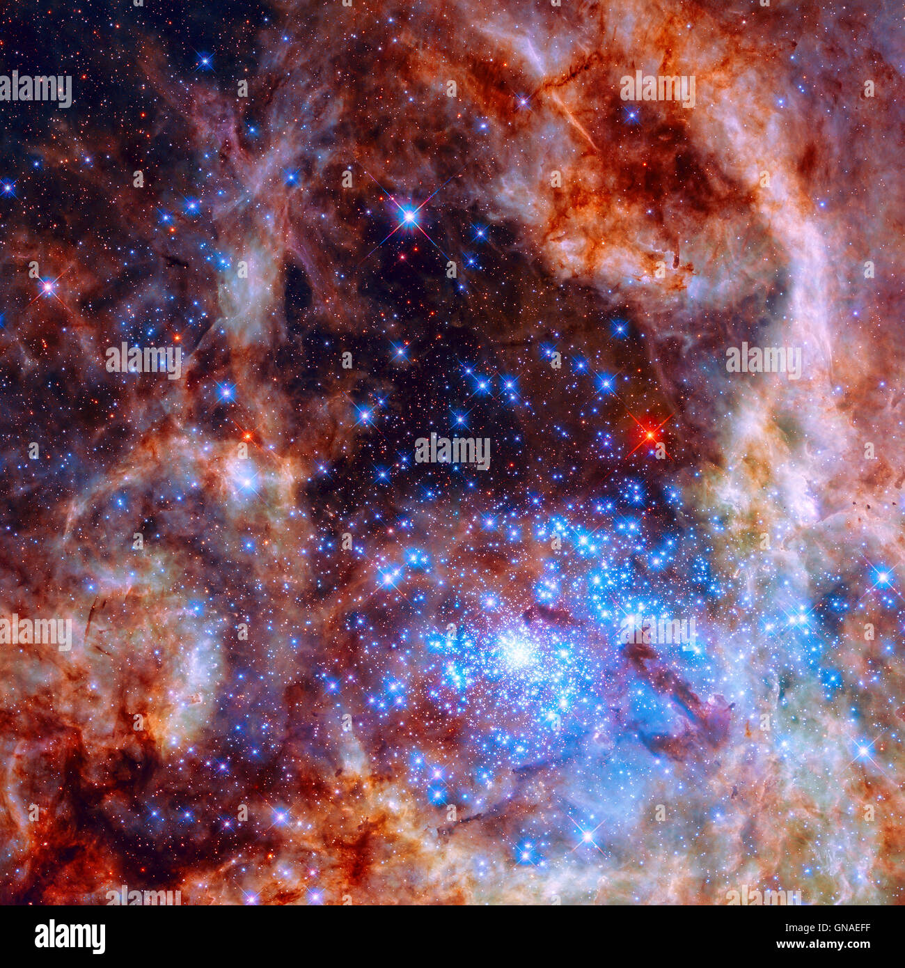 Central region of the Tarantula Nebula in the Large Magellanic Cloud. The young and dense star cluster R136. Stock Photo