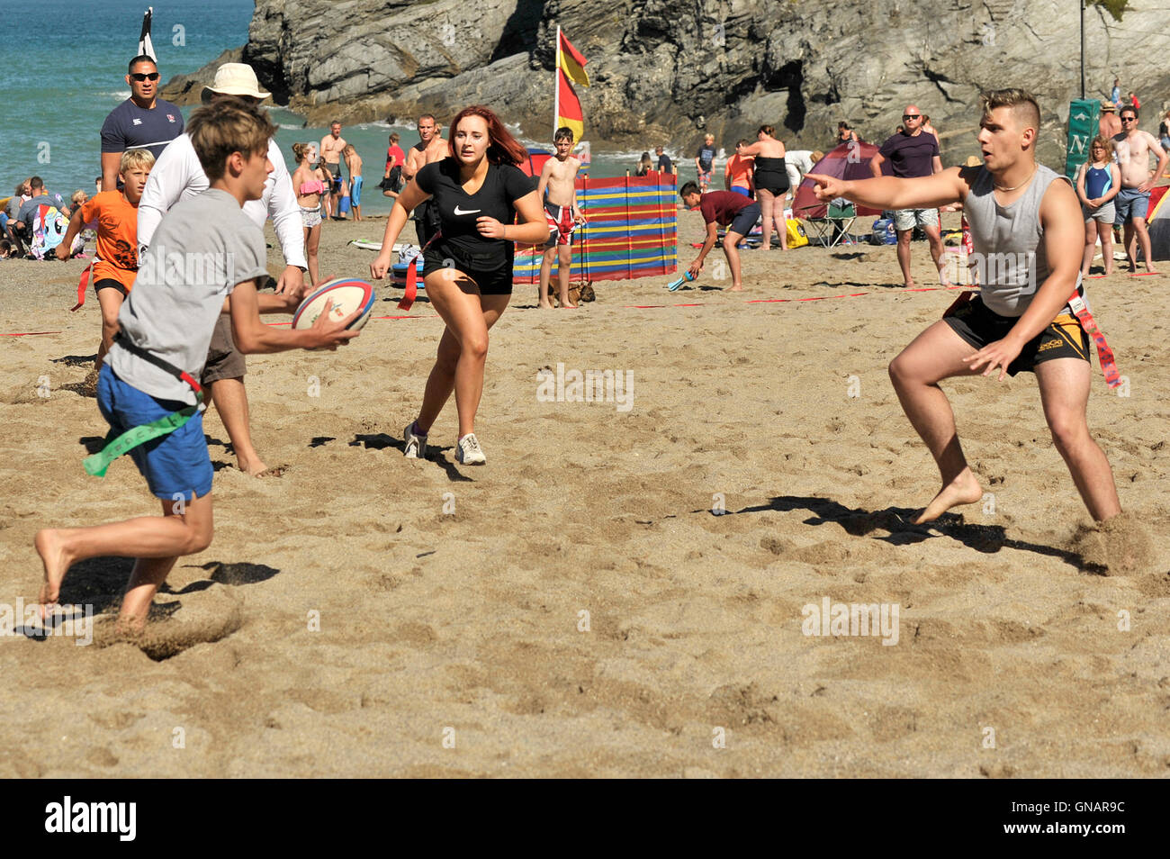 The annual Lusty Glaze Beach Tag Rugby tournament in Newquay, Cornwall. Stock Photo