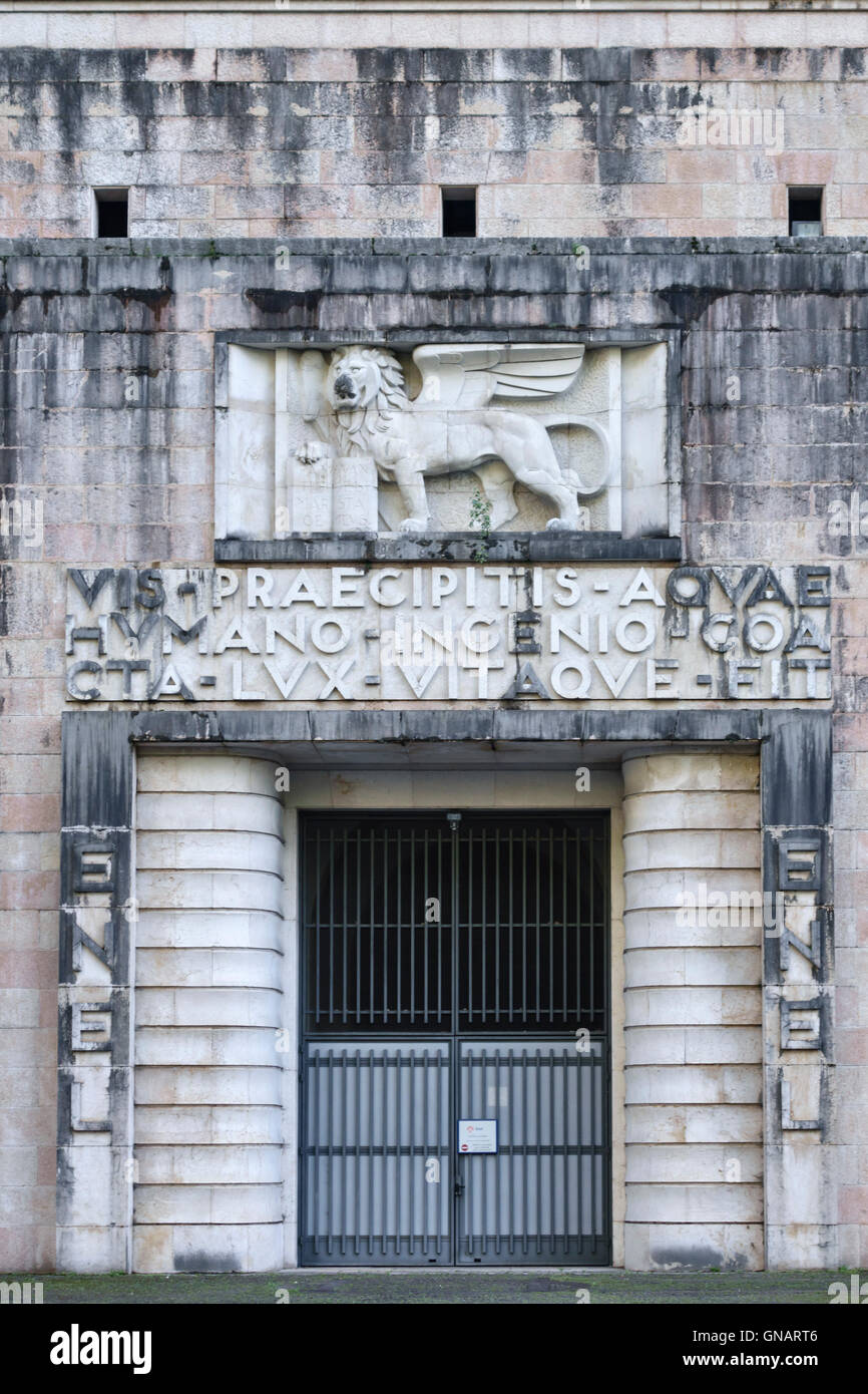The Dolomites, Trentino, Italy. Entrance to a hydro-electric power station in the mountains north of Belluno Stock Photo