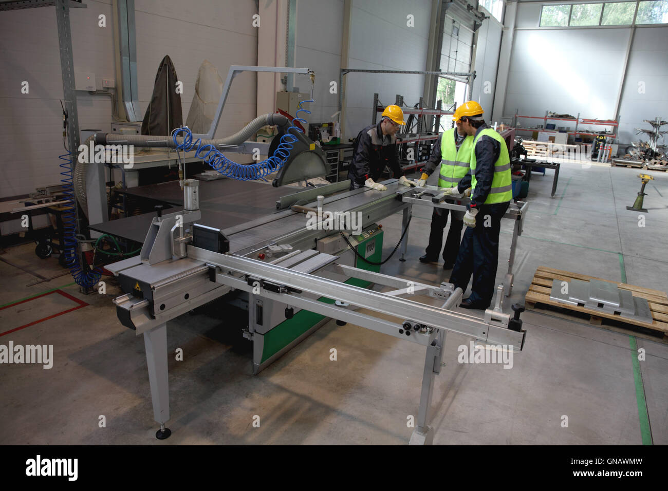 Workers at CNC machine shop with lathes Stock Photo Alamy