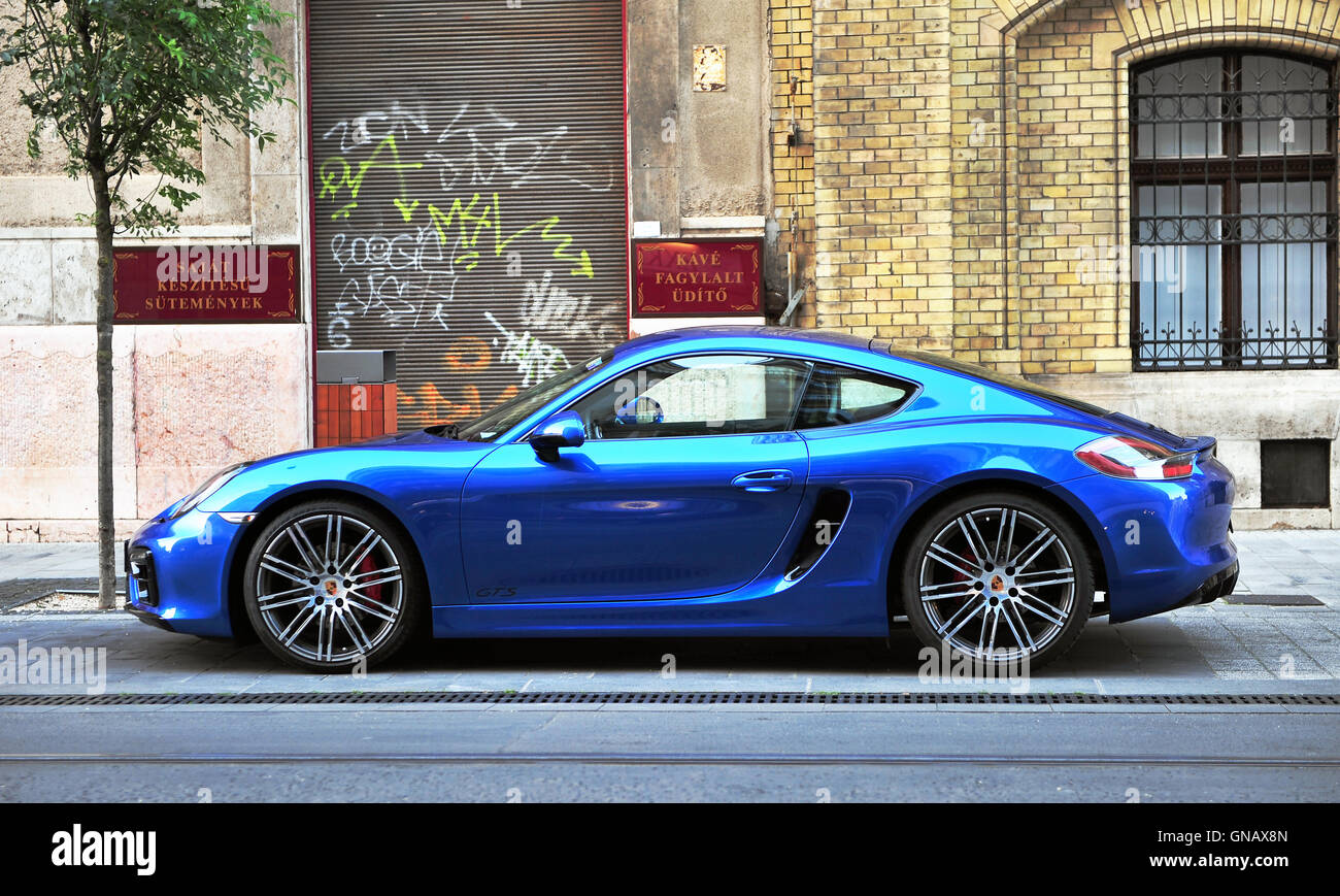 BUDAPEST MAY 20, 2016 Deep blue Porsche sport car in the street of