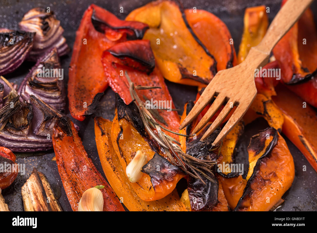Grilled red sweet pepper and onion Stock Photo - Alamy
