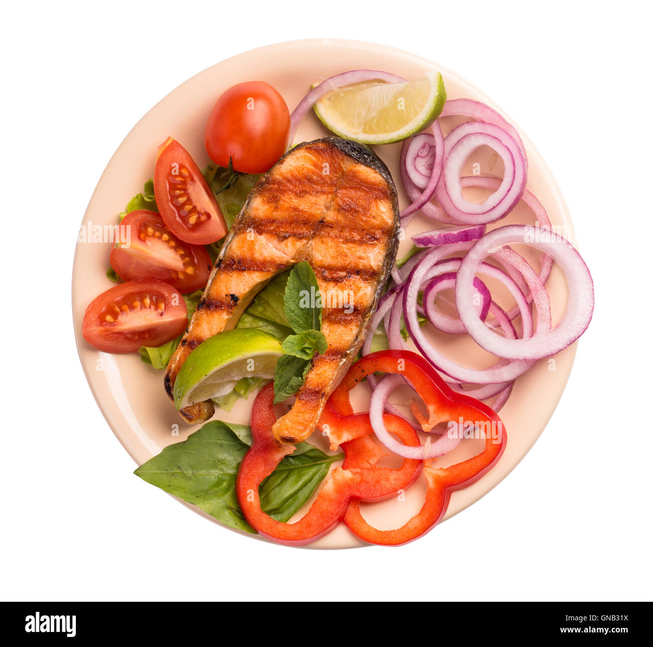 Grilled salmon steak on plate isolated on white background Stock Photo ...