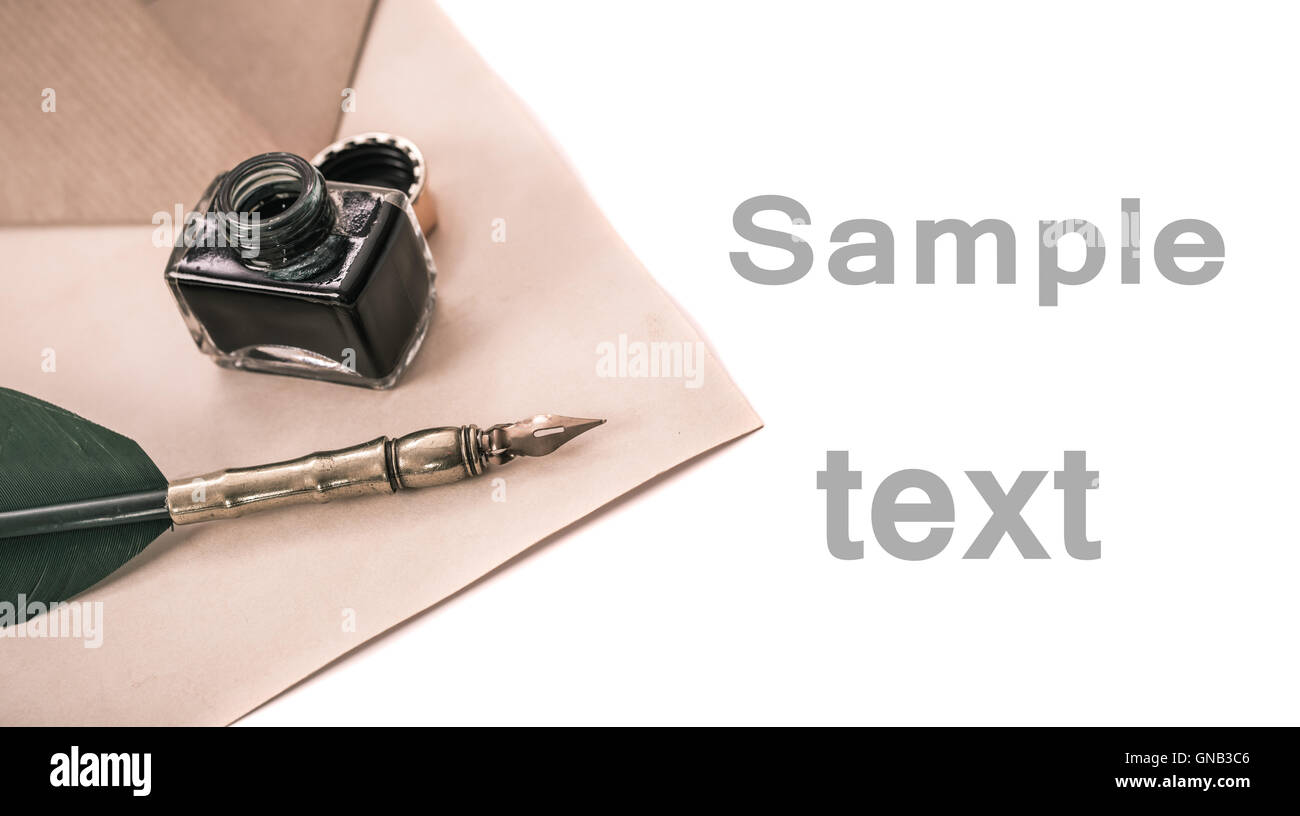 Inkwell with quill pen with copy space Stock Photo Alamy