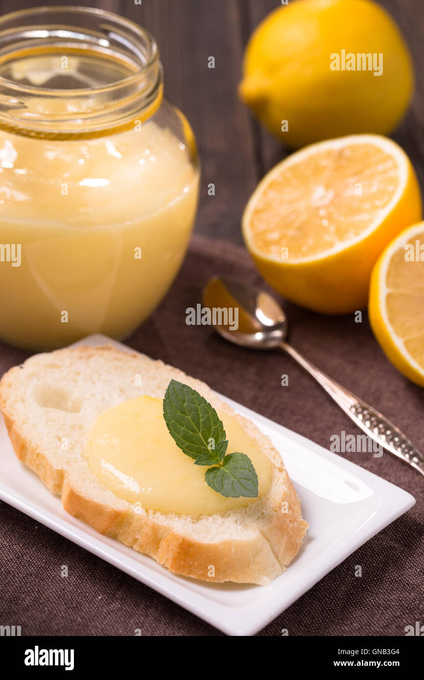 Lemon curd on bread Stock Photo Alamy