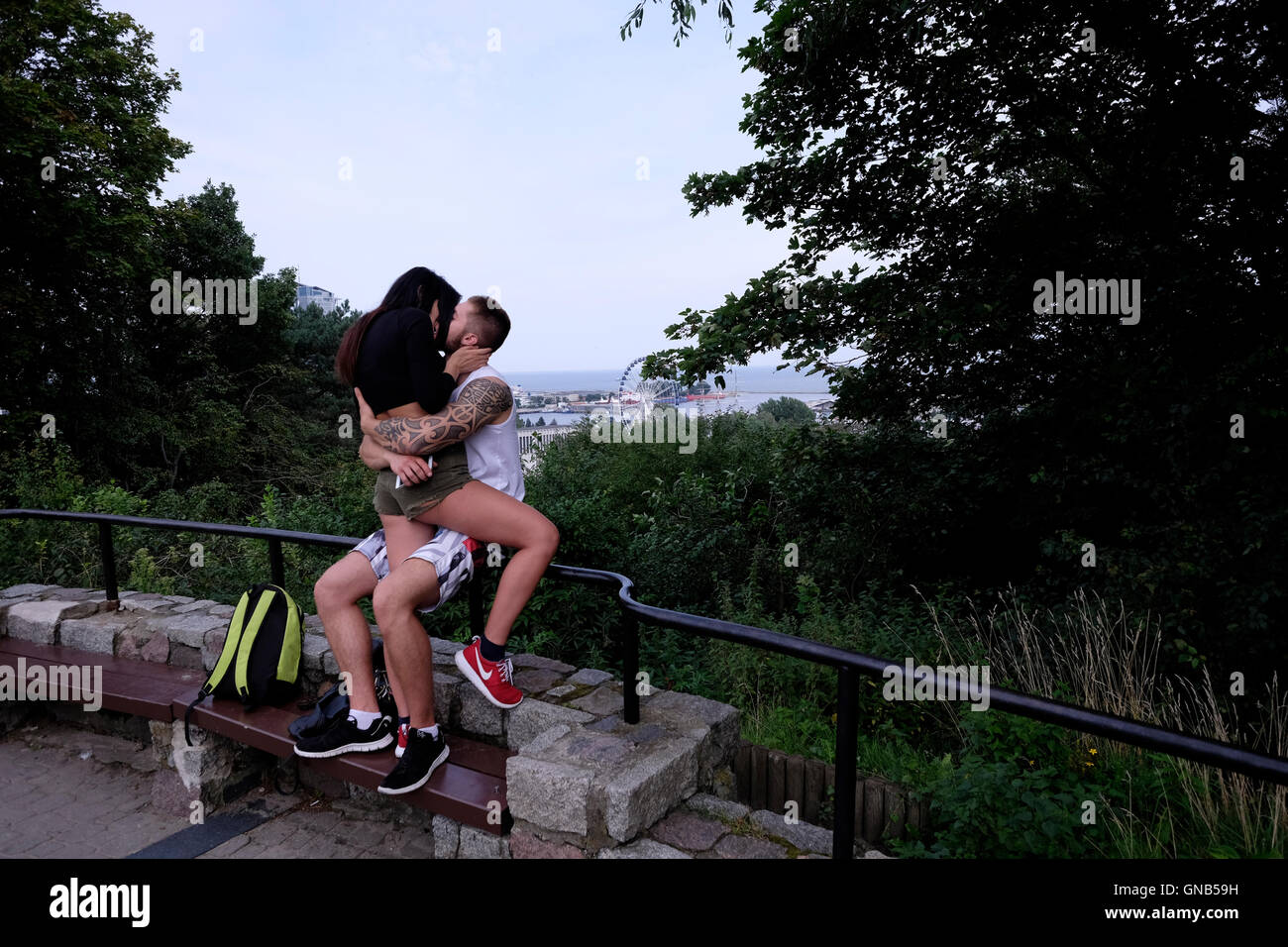 Young Polish couple kissing in Kamienna Gora an observation point in the city of Gdynia a seaport city in Gdansk Bay northern Poland Poland Stock Photo
