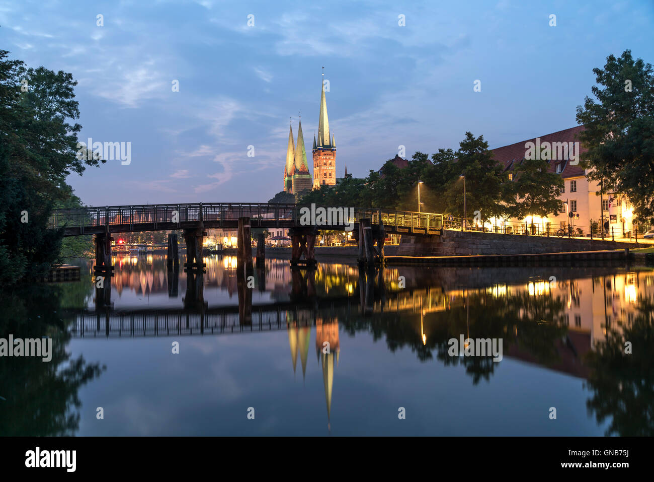old town and river Trave at dusk, Lübeck, Schleswig-Holstein, Germany Stock Photo