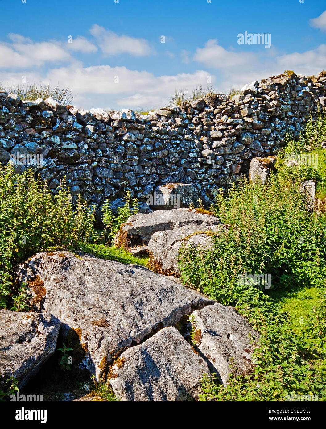 a dip in the dry stone walling Stock Photo