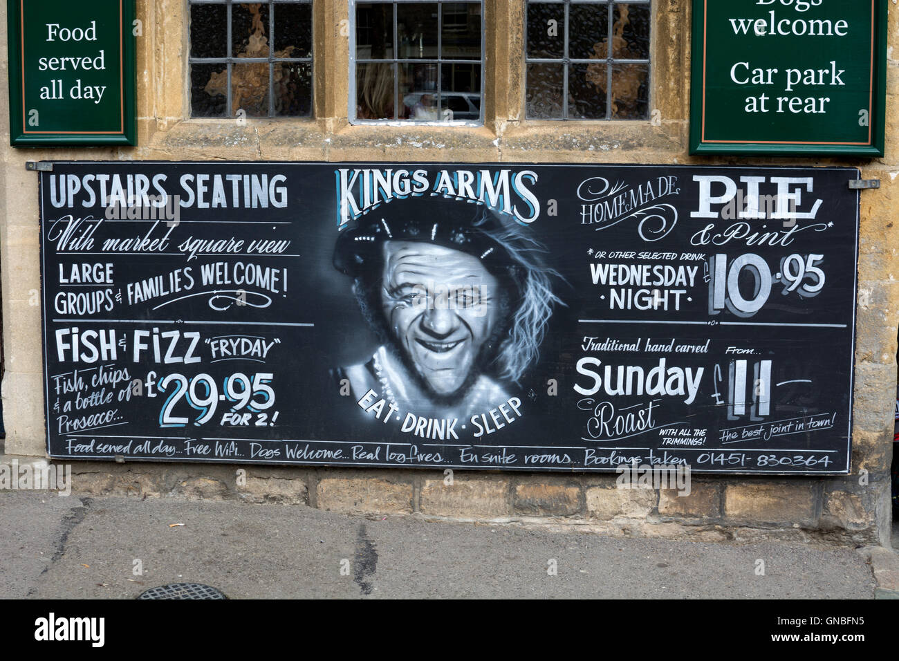 Kings Arms sign with Sid James face, Stow-on-the-Wold, Gloucestershire, England, UK Stock Photo