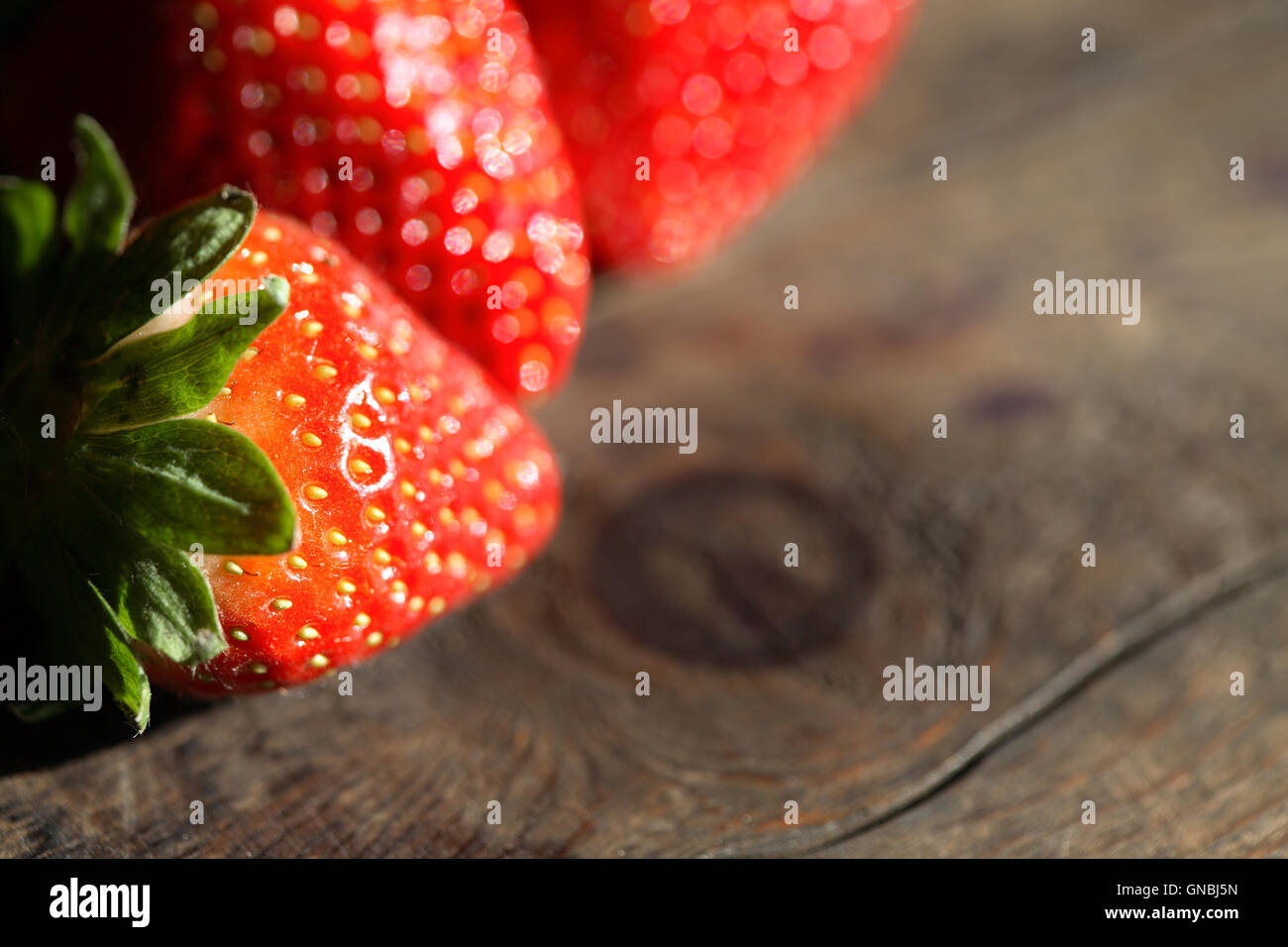 Strawberry On Wood Stock Photo