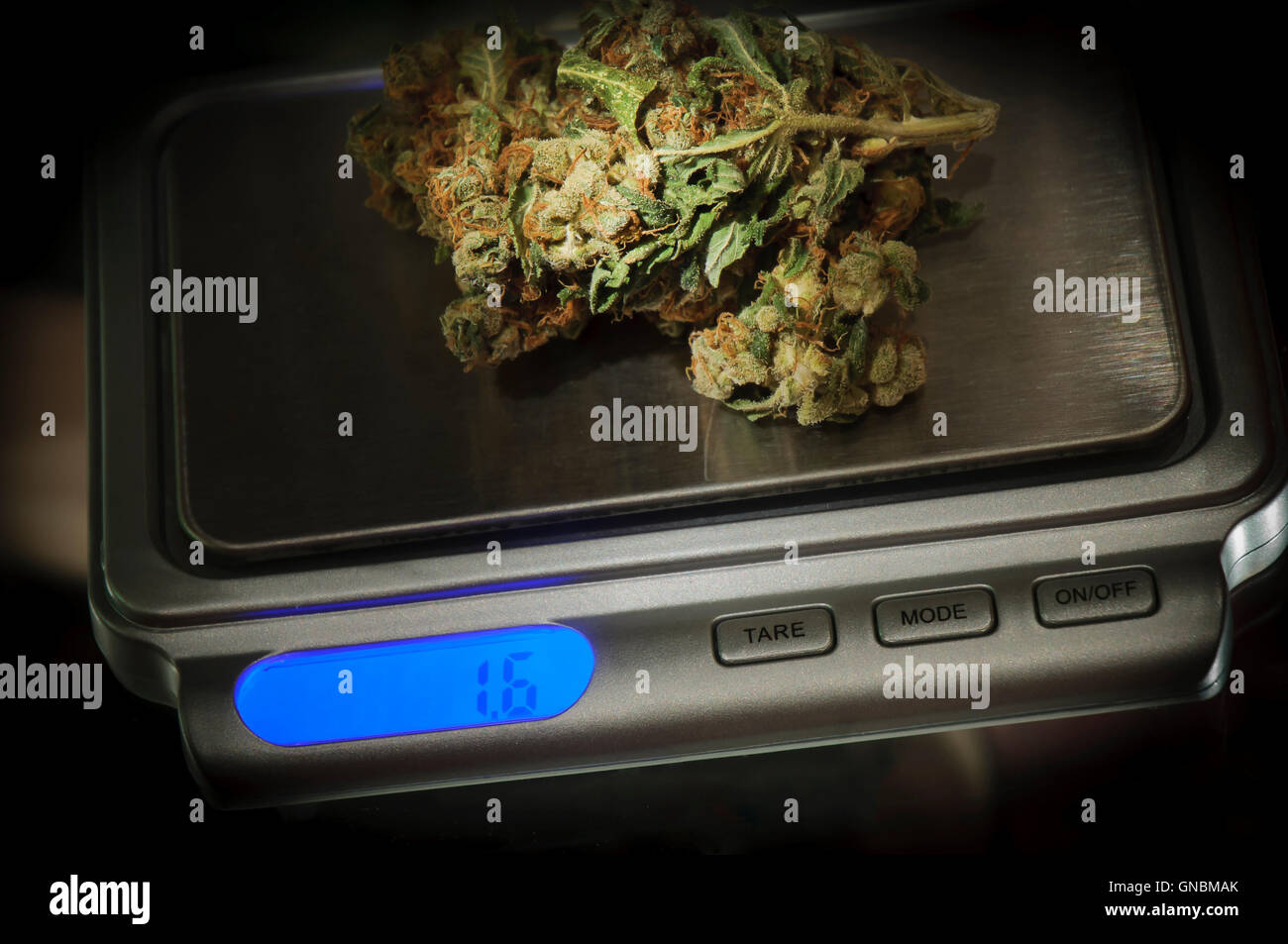 Cannabis Weight Scale With Wooden Pipe & Marijuana Stock Photo, Royalty-Free