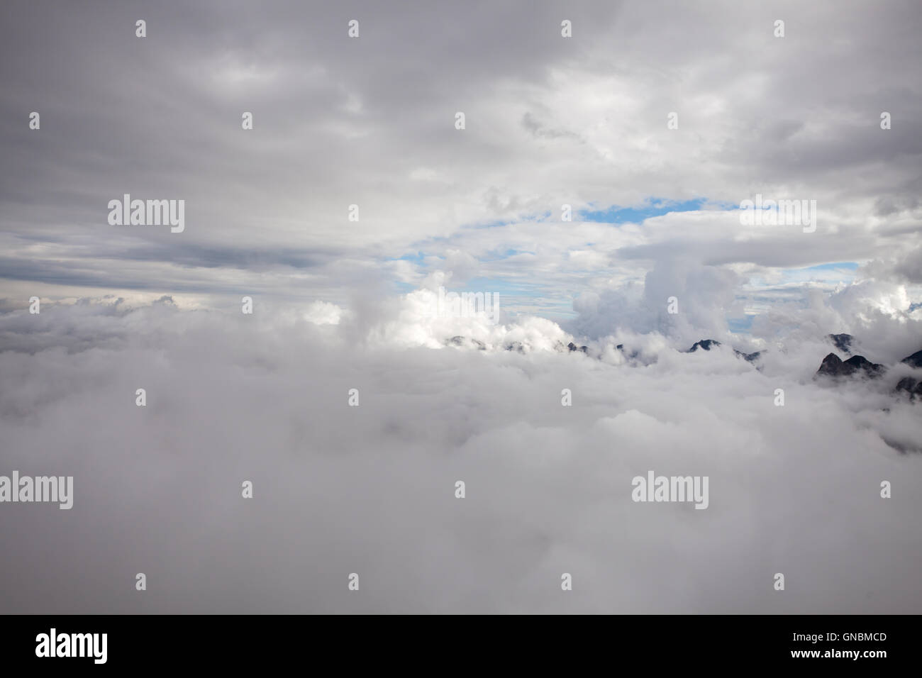clouds in the italian alps Stock Photo - Alamy