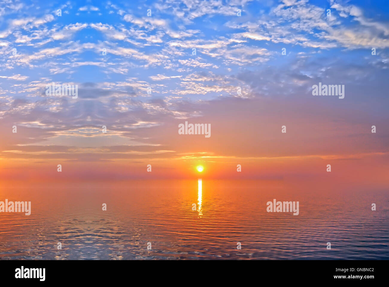 Ocean sunset background image Stock Photo - Alamy