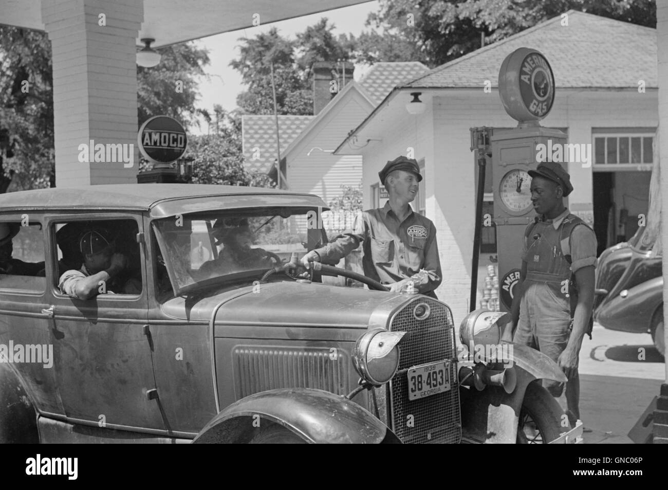 Gas Station Attendant Filling Car with Gasoline, Atlanta, USA