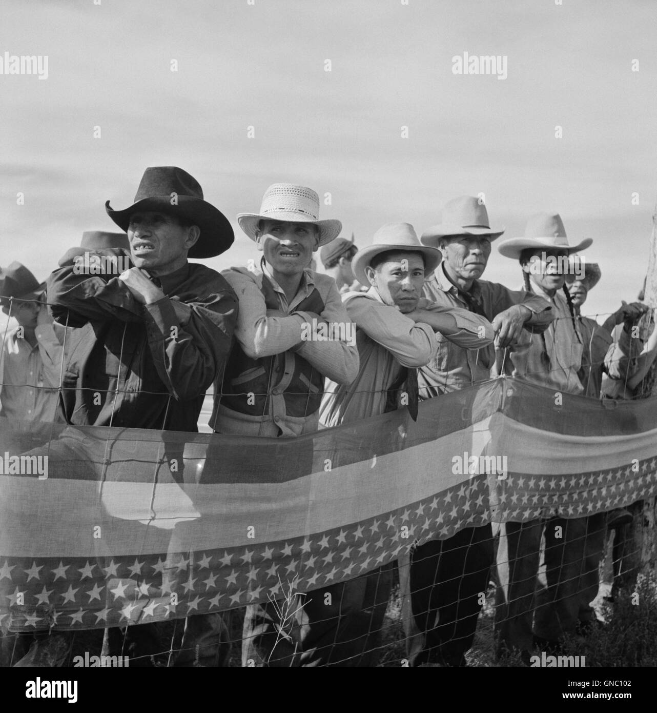 Native Americans Watching Crow Fair, Crow Agency, Montana, USA, Marion Post Wolcott for Farm Security Administration, July 1941 Stock Photo
