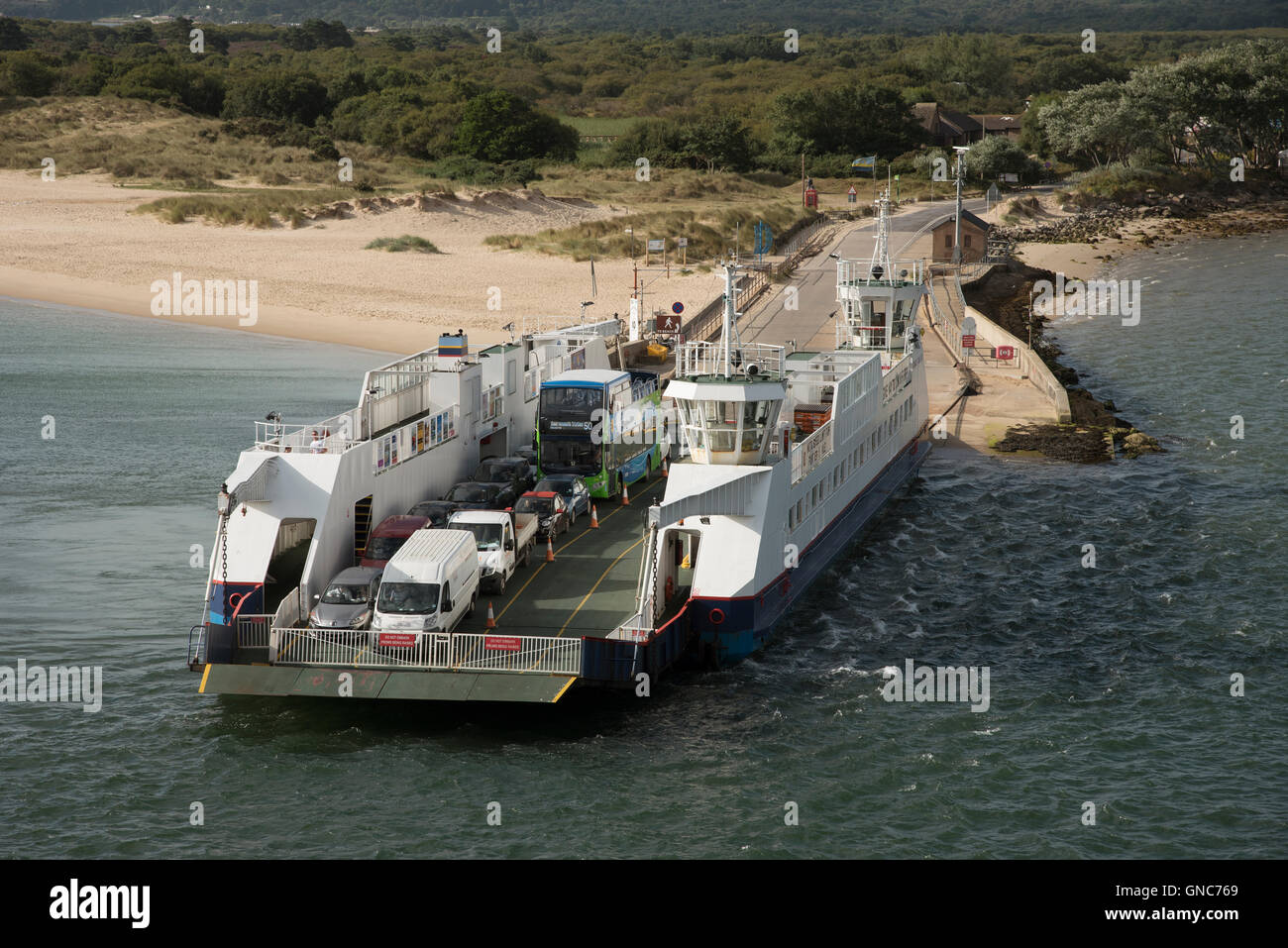 The Sandbanks to Studland vehicular ferry waiting to cross the entrance