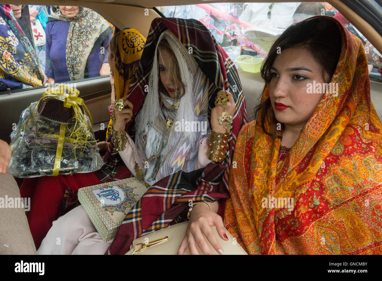 Bandar Torkaman, Turkmen Wedding, Bride Sitting With Female Relatives Inside Bridal Car Stock Photo