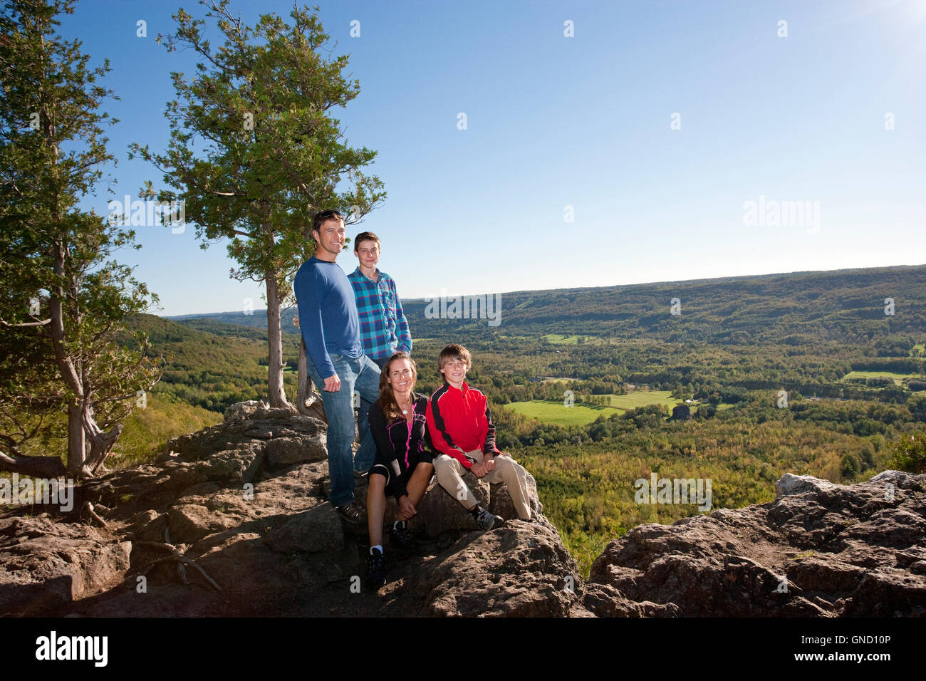 family hiking overlooking valley Canada, Ontario, Beaver Valley Stock Photo