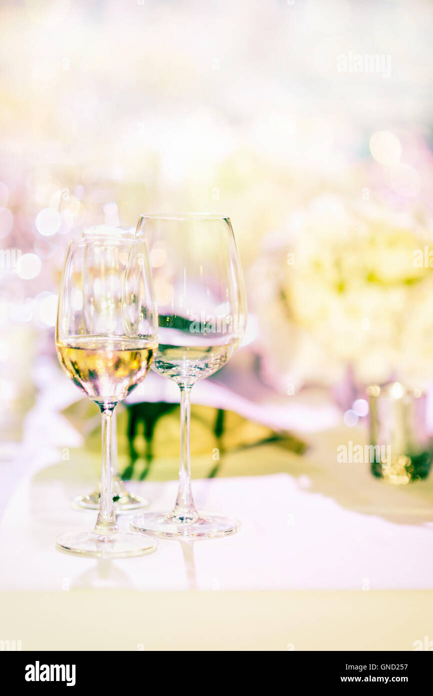 Glass of white wine in sweet background. selective focus. Stock Photo