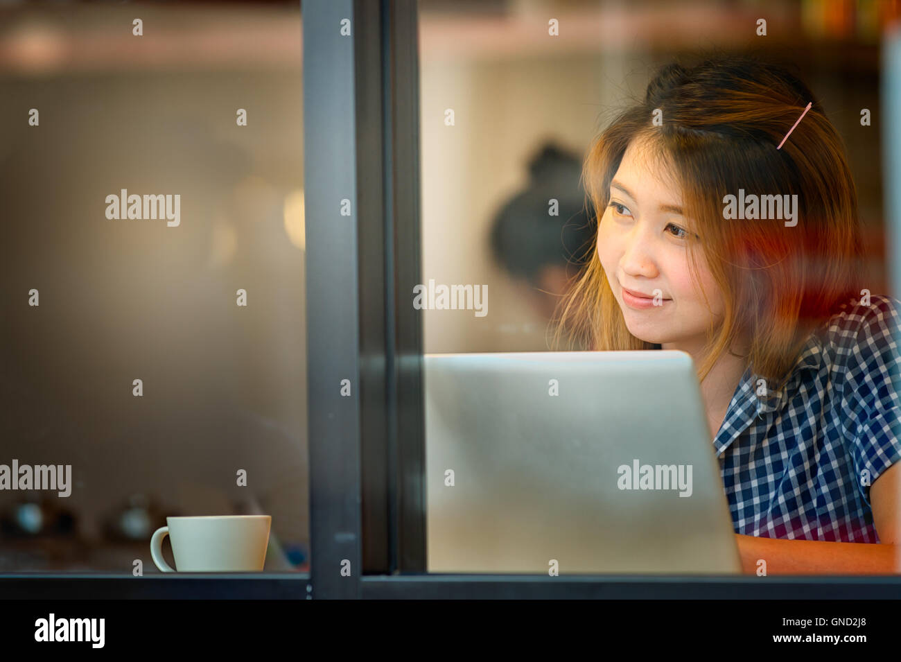 Portrait asia young woman working on laptop in coffee shop, Vacations ...