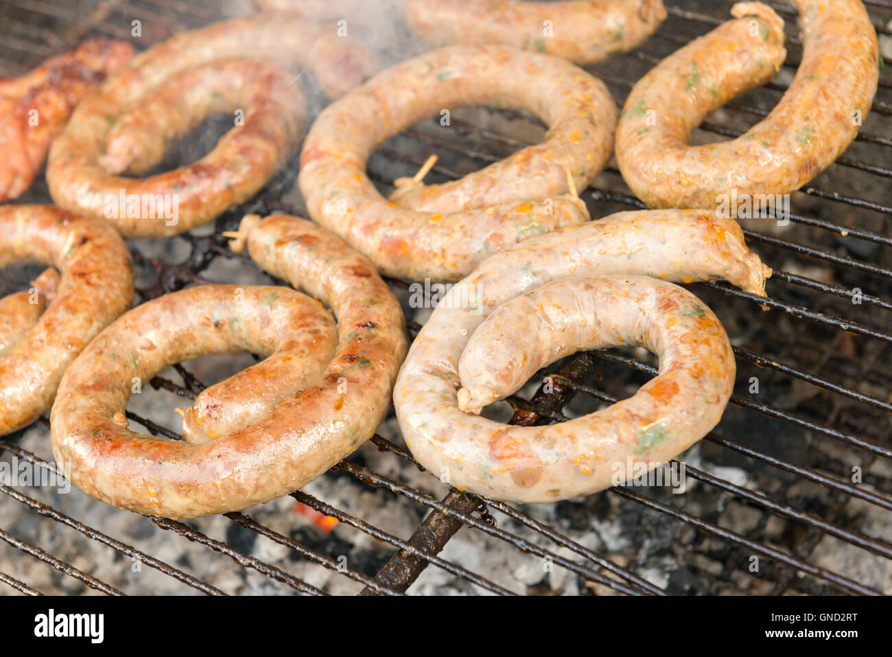 Thai sausage, homemade northern Thai sausage on grill. Stock Photo