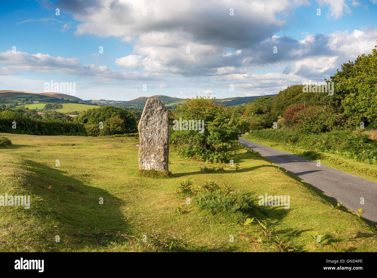 A standing stone commemorating the Silver Jubilee of Queen Elizabeth at Leusdon on Dartmoor Stock Photo