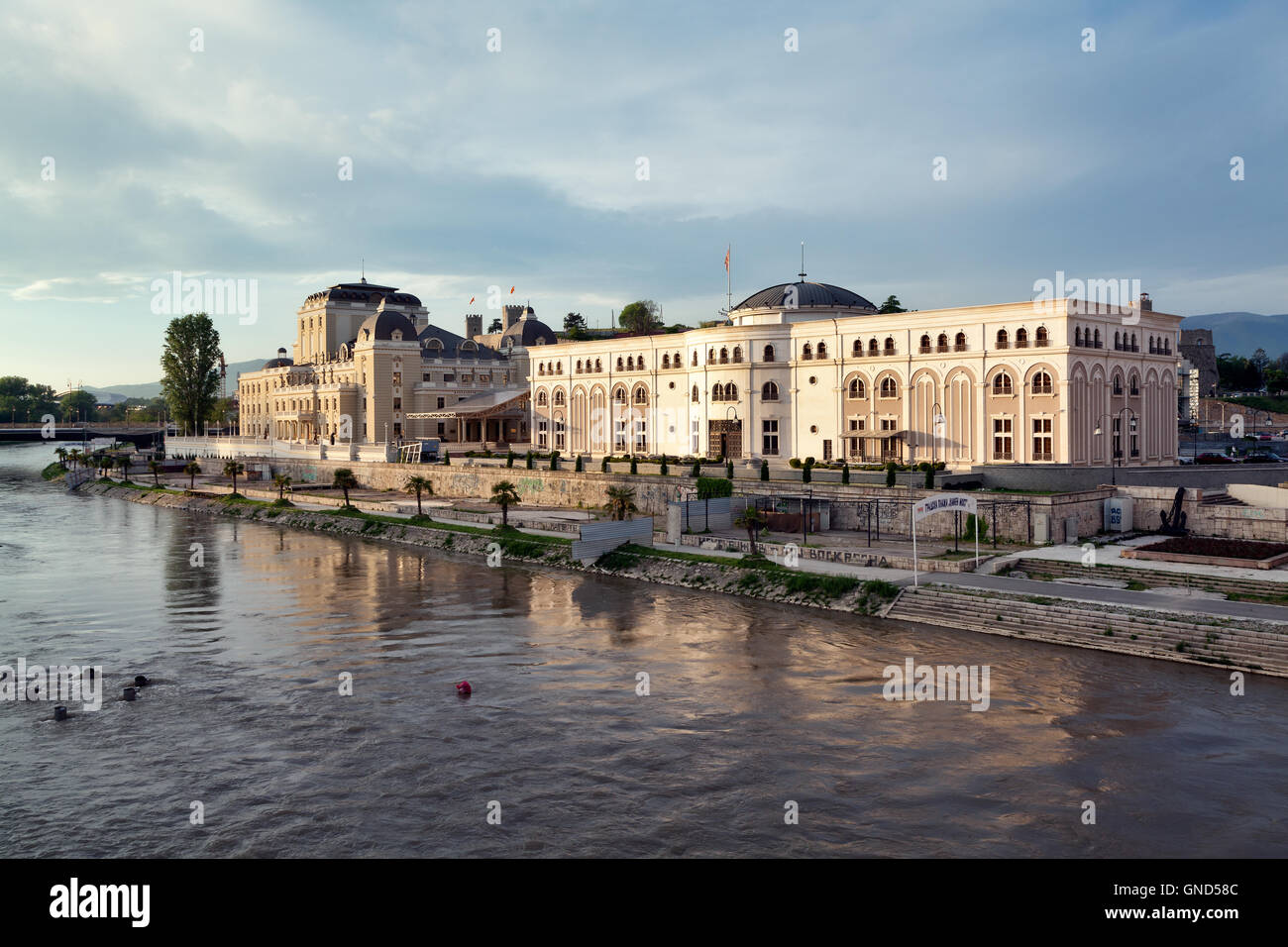 Museum of the Macedonian Struggle and new theatre along Vardar river, Skopje city centre, Macedonia Stock Photo