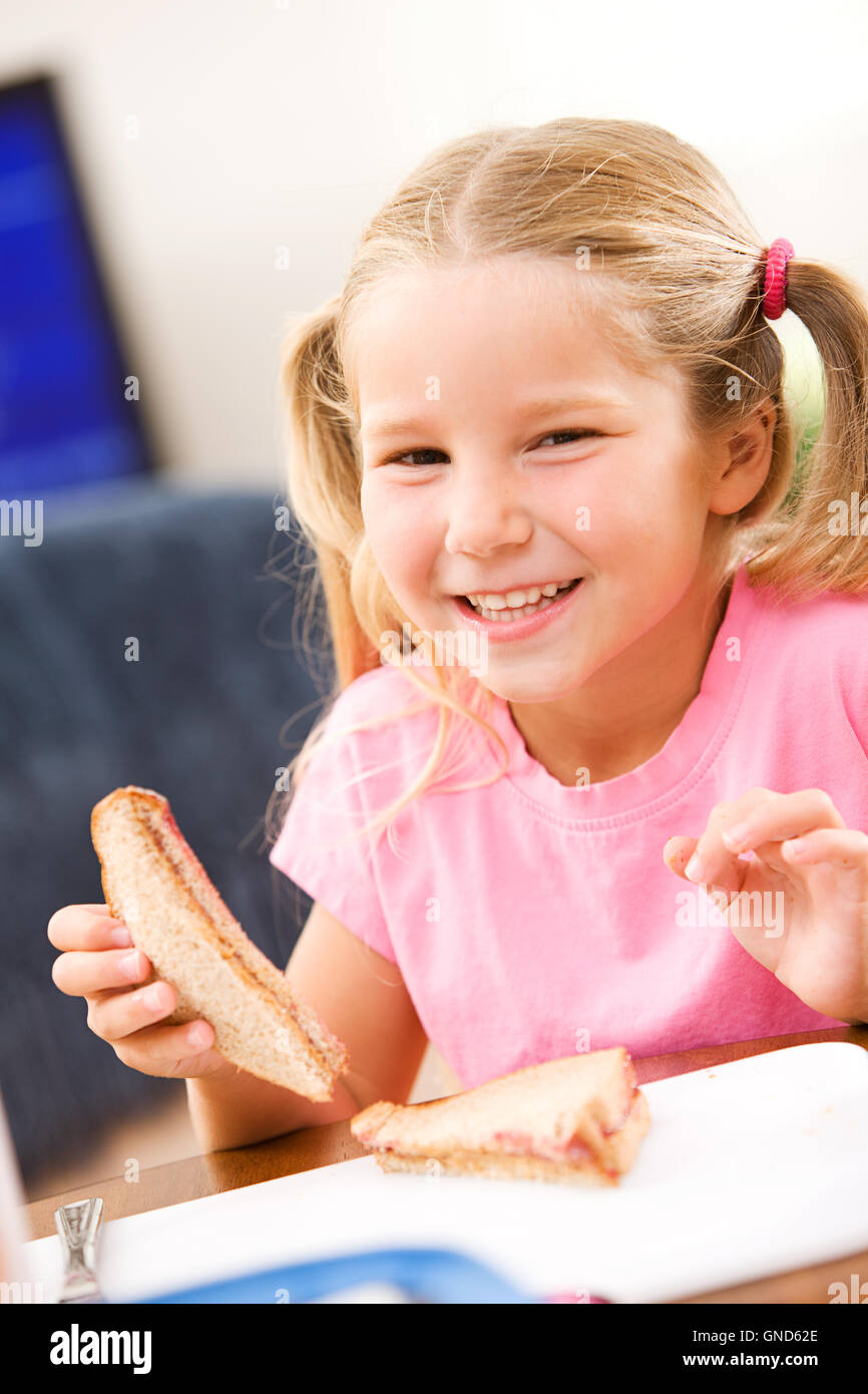 Girl and mother at home, doing school related activities flash cards