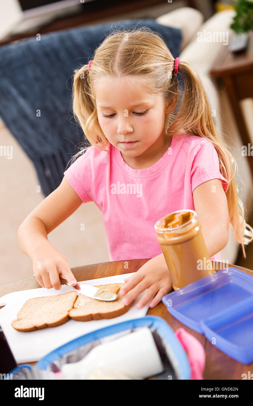 Girl and mother at home, doing school related activities flash cards